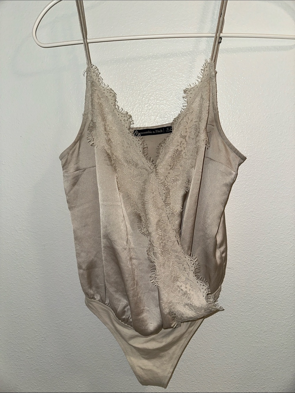 Abercrombie and Fitch Lace Bodysuit . in a silky beige color. Size small